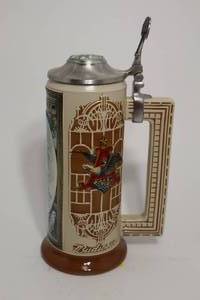 lot 50 image: Malt-Nutrine 1906 Calendar Series Winter Stein