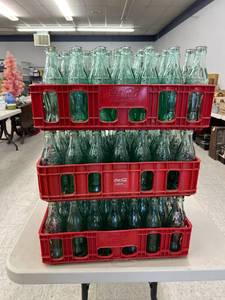 lot 63 image: Glass Coca-Cola Bottles (100) in Coca-Cola Totes