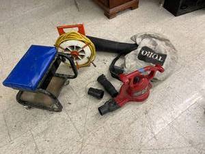 lot 102 image: Shop Stool, Extension Cord on Reel & Toro Vac