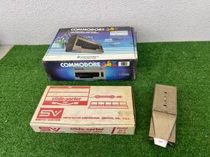 lot 107 image: Commodore 64, Slide-Sorter & Ajax Dispenser