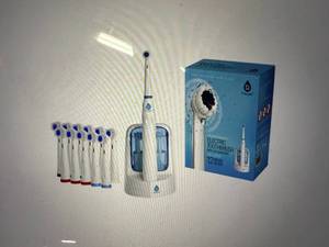 lot 35 image: Pursonic Deluxe Rotary Rechargeable Toothbrush