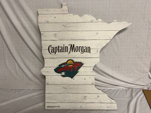 lot 69 image: Wooden Captain MorganMinnesota Wild Themed Cut Out