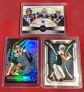 lot 102 image: (3) Tim Tebow Cards - One Rookie