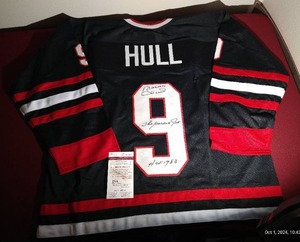 lot 216 image: Bobby Hull  Autographed & Authenticated Black Hawks Jersey