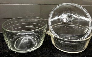 lot 76 image: Two Clear Pyrex Pieces  1 Bowl & Covered Dish