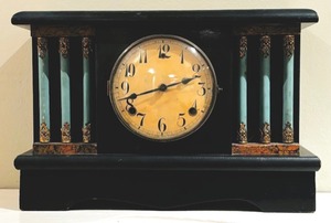 lot 55 image: Antique Black Mantel Clock with Turquoise Pillars