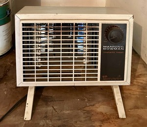 lot 93 image: Small Manning Bowman Space Heater