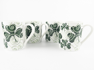 lot 95 image: Set of 4 SHAMROCKS OF ERIN Shamrock Pattern Coffee Mugs