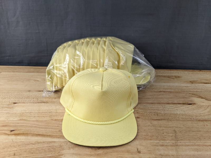 lot 81J image: 60 Brand New Yupoong Maize Hats OSFM A