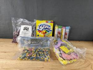 lot 102 image: New Assortment of CandySnacks - Cinnamon Buttons, Fruit Gushers, Jolly Ranchers, Sour Punch Straws, and more B