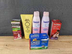 lot 208 image: New Assortment of Health Care Products include Coppertone, Sun Bum, Claritin, Tylenol, and Robitussin W