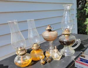 lot 59 image: Collection of 7 Various Sized Oil Lamps