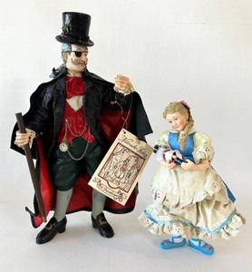 lot 76 image: MIDWEST IMPORTERS Nutcracker Fantasy PAPER MACHE Clara and Herr Drosselmeyer Figurines