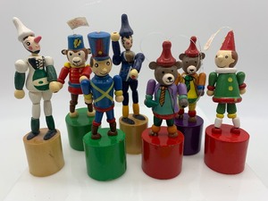 lot 18 image: 7 Vintage DEPT 56 Wood Push Puppet Ornaments