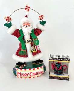 lot 95 image: MARY ENGELBREIT - Fabric Mache Candy Santa and Teapot Ornament