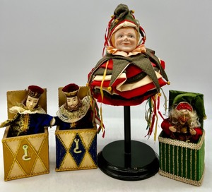 lot 173 image: Vintage ENESCO Bisque Holiday Jester on Wooden Base & 3 Jack-In-the Box Characters