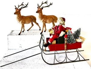 lot 232 image: CHRISTMAS IN AMERICA Santa in His Sleigh with Reindeer Figures