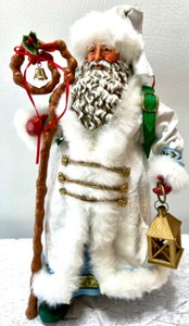 lot 240 image: The American Artist CLOTHTIQUE COLLECTION by POSSIBLE DREAMS Lighting The Way Santa with Box 1992