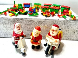 lot 250 image: Lot of Many Plastic BRUDER German Plastic Toy Trains, Cars, Boat & Planes with Vintage Plastic Santas