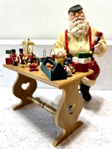 lot 263 image: MIDWEST OF CANNON FALLS Fabric Mache Santa Sitting At Bench Painting Toys Figure