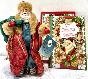 lot 365 image: LYNN BYWATERS FERRIS 1991 The American Artist CLOTHTIQUE COLLECTION by POSSIBLE DREAMS A Peaceful Eve Santa Figure & A Christmas Garland Book NIB