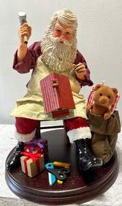 lot 376 image: KURT S ADLER FABRICHE COLLECTABLES designed by TOM RUBEL Santa Figure with Box