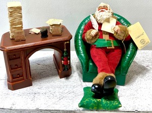 lot 377 image: Limited Edition KURT S ADLER FABRICHE COLLECTABLES Santa Figure in Chair with Desk