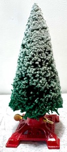 lot 402 image: Vintage Miniature Shag Flocked Christmas Tree on Red Cast-iron Base