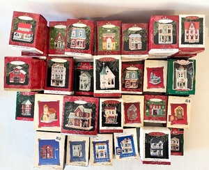 lot 545 image: HALLMARK Keepsake Houses NIB Ornament Bundle and Bonus Collectors Guide