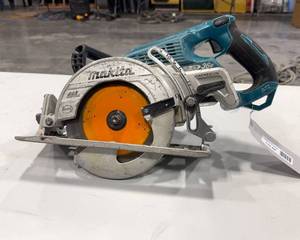 lot 68 image: 36V Makita Rear Handle Saw w 2 Batteries