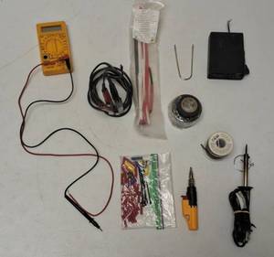 Box of Assorted Items Solder, Solder Irons, Electrical Tape, Vintage Road Runner Radar, CEN-TECH P30756 (Missing Red Probe)