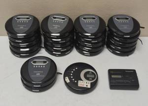 Assortment of CD Players - (22) Insignia (1) ONN & (1) Panasonic Cassette Walkman (No Headsets)
