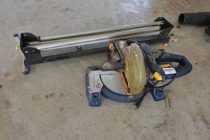 lot 279 image: Ryobi 7-14 Miter Saw with Stand