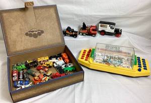 lot 28 image: 1995 Collectible Windsor on Ice Hockey Game and Vintage Ertl, Matchbox and Hot Wheels Vehicles