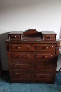 lot 43 image: Antique Wooden Dresser with Multiple Drawers