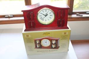 lot 55 image: Gold Label Symphony Surprise Angel Orchestra Clock