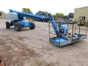 lot 22 image: 1999 Genie S65 4WD Boom Lift - For Parts or Repair
