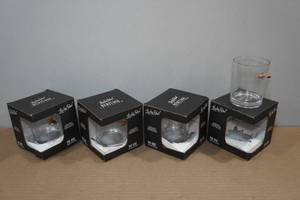 lot 108 image: 4 Lucky Shot Rocks Glasses with Embedded Bullets