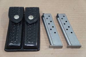 lot 139 image: 2 Smith & Wesson .40 S&W Magazines with Leather Pouch