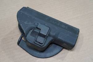 lot 143 image: Pistol Paddle Holster for Canik TP9