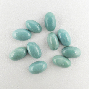 lot 54 image: 10 TURQUOISE - 1.86ct. Oval cabachon cut