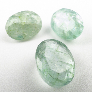 lot 62 image: BERYL - 14.63ct. Dyed Green Oval cut