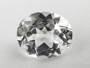 lot 67 image: WHITE SAPPHIRE - 5.9ct. Oval brilliant cut