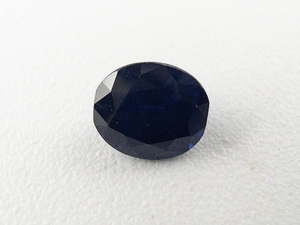 lot 72 image: NATURAL BLUE SAPPHIRE - 0.59ct. Dark Blue Oval brilliant cut