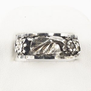 lot 135 image: Chapal-Zenray Floral Open Work Sterling Silver Band. Size 7 - 7.25.