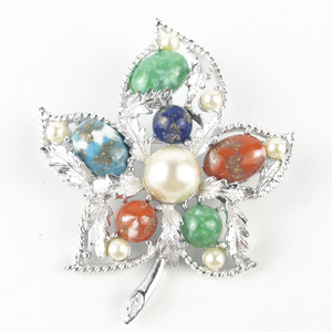 lot 231 image: Sarah Coventry Fantasy Multi-Gemstone Silver Tone Base Metal Leaf Brooch .