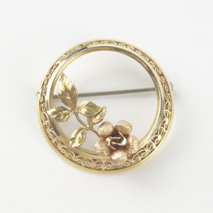 lot 242 image: Krementz Rose And Leaf Detail Rose And Yellow  Gold Filled Brooch .