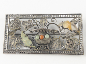 lot 6-243 image: Unknown Maker (CrossT)) Cannetille Picture Frame With Vase And Stylized Flowers Silver Tone Base Metal Brooch .