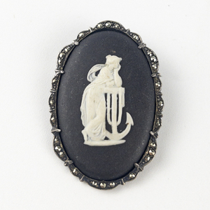 lot 249 image: Wedgwood Jasperware Black And White Sterling Silver Brooch . Marcasite Set Decorative Frame.