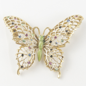 lot 260 image: Multi-Colored Rhinestone Accented Gold Plated Base Metal Brooch .
